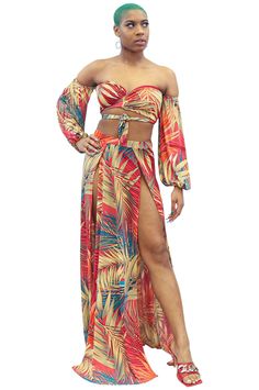 This is a multi-functional, off-shoulder 2-piece maxi skirt set/cover-up that features two deep side splits, long loose puffer sleeves, and a front tie. The maxi skirt has under panties attached. Multicolor tropical pattern. Size range from small to 2x. Great for poolside/vacation wear. Two-piece Maxi Skirt For Beach Spring Season, Spring Beach Two-piece Maxi Skirt, Off-shoulder Beach Sets For Spring, Off-shoulder Summer Vacation Sets, Summer Off-shoulder Vacation Sets, Beachwear Maxi Skirt For Party, Beach Skirt With Side Slits, Beach Skirt With Side Slits And Split Shape, Beach Skirt With Side Slits And Split