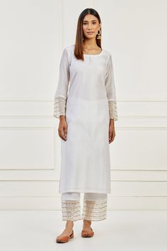 White kurta with chita embroidered cuffs and round neck. Paired with pant and embroidered dupatta
Component: 3
Pattern: Embroidered
Type Of Work: Chita
Neckline: Round
Sleeve Type: Long Sleeves
Fabric: Chanderi, Tissue Organza
Color: White
Other Details: 
Embroidered dupatta
Chita work
Occasion: Sangeet - Aza Fashions Embroidered Cuffs, Kurta Pant Set, White Kurta, Embroidered Dupatta, Kurta With Pants, Off White Color, Pant Set, White Pants, Set For Women