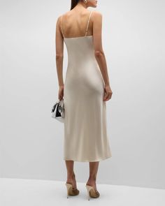 This Taylor silk slip dress from Sablyn adds effortless elegance to your Instagram feed. With an adjustable scoop neck and spaghetti straps flowing into a floor-grazing hem, it photographs beautifully from every angle. Crafted from high-quality lustrous silk that drapes on the body, every curve will look fabulous. As comfortable to wear as it is to style, this classic yet on-trend piece deserves a starring role in your best Instagram outfits. Treat yourself to this American-made silk slip for be Summer Slip Dress With Straight Neckline For Dinner, Spring Slip Dress With Spaghetti Straps For Dinner, Chic Slip Dress With Spaghetti Straps For Dinner, Chic Spaghetti Strap Slip Dress For Dinner, Sleek Solid Midi Slip Dress, Bias Cut Midi Slip Dress For Dinner, Bias Cut Midi Length Slip Dress For Dinner, Sleek Summer Slip Dress For Dinner, Sleek Slip Dress For Dinner And Spring