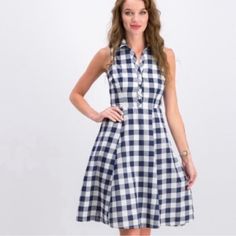 Banana Republic Navy/White Gingham Shirt Dress Approximate Flat Measurements: Shoulder To Hem Length - 38” Pit To Pit - 18” Waist - 15” Material - 100% Polyester Cute, Short , Fit And Flare Dress Is Lightweight.Perfect A Relaxed Look. One Small About 3” Line Marking A Little Below Waist ( Looks Like Print ), Not Obvious Unless You Look For It . Shown In Last Picture. Please See All Pictures And Video For Details. Please Contact If You Have Any Questions Spring Plaid Collared Dress, Spring Collared Plaid Dress, Classic Fitted Plaid Summer Dress, Collared Gingham Dresses, Collared Gingham Dress For Spring, Classic Gingham Dress, Chic Gingham Dress With Buttons, Casual Gingham Plaid A-line Dress, Summer Plaid Shirt Dress For Daywear