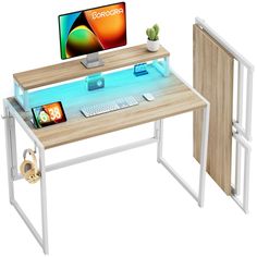 a computer desk with a monitor and keyboard on it