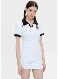 Define your style with the distinctive silhouette of this form-fitting white polo dress. Its smart collar and cuffed sleeves, highlighted by black trimming, offer a nod to the timeless tennis dress, reimagined for the modern woman. The embroidered badge on the chest elevates the piece with a sense of heritage and luxury. Crafted from a comfortable stretch fabric, this dress promises a snug fit that moves with you, making it a staple for those sunny days out or an active afternoon.Style: pullover White Polo Dress, Define Your Style, Drawstring Dress, Embroidered Badges, Drawstring Dresses, White Polo, Tennis Dress, Polo Dress, Days Out