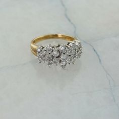 10K Yellow Gold Diamond Ring, diamond cluster, illusion setting, Ring size 8.5, 5.5 grams Sku # R00479A This listing contains photographs of the actual item you will receive. Our items are in excellent condition with little or no signs of wear and many are one of a kind pre-owned estate finds. Please look closely at the pictures in this listing as they are part of the product description. Please read the description, as any imperfections or condition comments will be included. We do our best to Yellow Gold Diamond Ring, Gold Diamond Ring, Fine Jewelry Designers, Ring Diamond, Multi Stone Ring, Blue Topaz Ring, Gold Diamond Rings, Diamond Cluster, Multi Stone