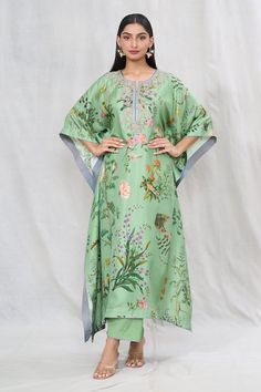 Light green kaftan with multi colored floral prints and embroidered yoke. Comes with solid pant. - Aza Fashions Traditional Green Floral Print Kaftan, Traditional Green Floral Kaftan, Spring Green Kaftan With Printed Motifs, Bohemian Green Sets With Floral Embroidery, Green Bohemian Sets With Floral Embroidery, Green Unstitched Silk Kaftan, Green Kaftan With Printed Motifs, Spring Green Salwar Kameez With Embroidered Border, Spring Silk Sets With Embroidered Border