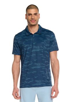 #color_storm-blue Sporty Collared Golf Polo Shirt, Navy Sporty Polo Shirt For Golf, Sports Polo Shirt With Go-dry Technology, Sports Collared Polo Shirt With Moisture-wicking Fabric, Moisture-wicking Collared Polo Shirt For Athleisure, Athleisure Moisture-wicking Collared Polo Shirt, Moisture-wicking Athleisure Polo Shirt, Collared Polo Shirt For Golf In Athleisure Style, Navy Moisture-wicking Collared Polo Shirt