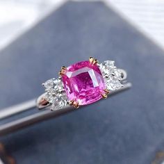 Pink Sapphire and Diamond Engagement Ring:Main Stone: Natural Pink Sapphire 1.4-1.5 ct Side Stones: Natural Diamonds 0.4 ct Metal: 14K Solid GoldCustom Order:This Unique Pink Sapphire Engagement Ring can be customised in Rose,White and Yellow Gold. The Sapphire has a gorgeous pink color. This stunning sapphire ring is offered in other sizes, metal, and the central stone can be upgraded/downgraded to suit your preference and budget. We have a great selection of Sapphires as well as other natural Blue Green Sapphire Ring, Pink Sapphire Engagement Ring, Montana Sapphire Engagement, Montana Sapphire Engagement Ring, Sapphire Engagement Ring Set, Montana Sapphire Ring, Green Sapphire Engagement, Pink Sapphire Ring Engagement, Green Sapphire Engagement Ring