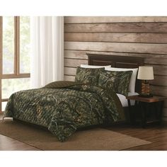 camo bed in a bag set with two nightstands and lamp on the side