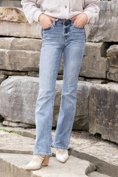 Product Features: Light wash bootcut Zipper fly closure, generous front pockets Designed for a relaxed fit Soft whiskering and minimal distressing Fit Details: Relaxed fit Rise (Sizes 0-15): 9.75 inches Rise (Sizes 14W-24W): 11 inches Inseam (Sizes 0-15): 32.5 Inseam (Sizes 14W-24W): 33 inches Fabric & Care: 93% Cotton, 6% Polyester, 1% Spandex. Medium weight fabric designed for moveability Sizing Find Your Perfect Judy Blue Fit: Size 1- 0 will be an oversized fit Size 2 - Select Size 1 Size 4 - American Honey, Denim Jacket Short, Denim Joggers, Fit Details, Blue Fits, Graphic Tops, Boot Cut Denim, Tall Girl, Wide Leg Denim