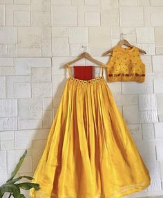 lehenga set  |womens lehenga choli |yellow red crop top lehenga set |designer haldi lehenga dupatta | wedding lehenga choli | lehenga usa Women's lehenga set /chiniya choli /teens embroidery lehenga skirt with dupatta /voggish      lehengas are one of the beautiful and versatile traditional attires of india !! we carry such pieces in budget with great quality that can be styled in multiple ways with different outfits !!       Here is Beautiful indo western hand embroidery soft tissue crop top in yellow color with hand embroidery paired with soft silk heavy gear skirt and contrast red dupatta as shown!! Skirt has heavy gear and both pieces can be mix and matched with different outfits !! Ready to ship All over the world !! details:  - blouse has halter neck(can be customized )and hand embro Designer Wear Lehenga With Traditional Drape For Summer, Summer Festive Lehenga With Traditional Drape, Summer Designer Lehenga Semi-stitched, Traditional Summer Lehenga Floor-length, Traditional Floor-length Lehenga For Summer, Fitted Lehenga For Designer Summer Wear, Summer Semi-stitched Lehenga, Summer Designer Semi-stitched Lehenga, Traditional Summer Floor-length Lehenga