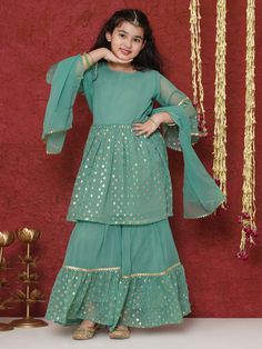 **Specifications : Please visit our brand store** https://www.etsy.com/in-en/shop/AJDezines?ref=seller-platform-mcnav Fit Type: Regular Specially handcrafted clothing for the perfect look and comfort for the Diwali Fabric Details:- Kurta - Georgette, Sharara - Georgette, Dupatta - Net, Linning Fabric - Blended Sales Package : - 1 Kurta, 1 Sharara and 1 Dupatta Feature - Foil Print, Round Neck, 3/4 Sleeves,Gota Patti Sharara Features- Elastic Waistband Closure, Foil Print Occasion: The Perfect se Festive Sharara With Self Design For Navratri, Festive Self Design Sharara For Navratri, Navratri Festive Sharara With Self Design, Festive Self-design Sharara For Navratri, Party Sets With Cutdana For Eid, Eid Party Dress With Gota Work, Festive Dress With Dupatta For Diwali, Pista Green Sharara For Navratri Party, Festive Sharara With Self Design For Celebrations