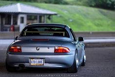 the back end of a silver sports car