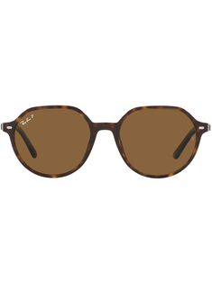 Brown Thalia round frame sunglasses from RAY-BAN featuring tortoiseshell effect, round frame, brown tinted lenses and curved tips. Protect your investment. This piece comes complete with a protective dust bag.. | Ray-Ban Thalia round frame sunglasses Round Frame Sunglasses, Round Frame, Ray Ban Sunglasses, Sunglass Frames, Ray Ban, Sunglasses Accessories, Ray Bans, Investment, Fashion Branding