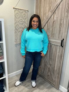 "Get cozy in style with this Aqua Blue Pullover Knit Mock Neck Sweater! Its cropped and oversized fit will keep you both warm and on-trend. Perfect for pairing with high-waisted jeans and boots for a relaxed yet chic look.(No itchy necks here!) Sizing is true to size, I'm in a size large for the perfect cozy feel. Comfortable Blue Sweatshirt For Fall, Solid Cropped Sweatshirt For Fall, Blue Cropped Sweater With Ribbed Cuffs For Fall, Casual Solid Cropped Sweater For Fall, Casual Solid Color Cropped Sweater For Fall, Trendy Cropped Blue Sweater, Trendy Relaxed Fit Cropped Sweater For Winter, Casual Blue Cropped Sweater For Winter, Casual Cropped Sweater With Relaxed Fit For Fall