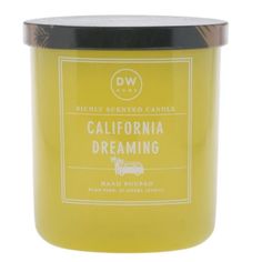 a yellow candle with the words california dreaming written on it's front and side