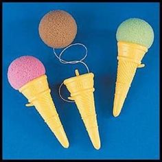 three ice cream cones are shown in front of a blue background with an ad for nuestros