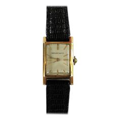 Elegant vintage Tiffany & Co. manual wind dress watch made with 18-karat yellow gold. It is slender and has a soft rectangular design. Classic Square Watch For Formal Occasions, Classic Square Watches For Formal Occasions, Classic Square Formal Watches, Vintage Yellow Gold Rectangular Watch, Vintage Rectangular Yellow Gold Watch, Gold Square Watch For Formal Occasions, Yellow Gold Rectangular Evening Watches, Rectangular Yellow Gold Evening Watch, Evening Yellow Gold Rectangular Watches