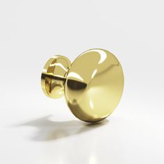 a gold door knob on a white background