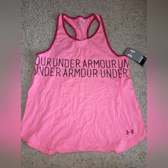 Brand New Under Armour Loose Tank Top Yxl. 57% Cotton/38% Polyester/5% Elastane. Smoke Free Home Pink Cotton Activewear With Graphic Print, Pink Cotton Workout Top, Pink Letter Print Tank Top, Pink Cotton Top For Workout, Under Armour Sporty Tops With Letter Print, Sporty Under Armour Tops With Letter Print, Pink Crew Neck Tank Top For Sports, Casual Pink Racerback Top, Casual Under Armour Top For Workout