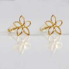 Complete your look with our lovely PAIR of 14k solid yellow/ rose gold or sterling silver wedding earrings.  These delicate studs are a perfect gift for nature lovers, for those you love most, offering dainty elegance in each piece of this nature jewelry collection.  This boho design of Lotus flower stud earrings is truly timeless. Amazing, fashionable, and stylish dainty flower stud earrings with a Lotus flower shape! These sweet silver studs are lightweight, cozy, and comfortable to wear. They Gold Flower Charm Earrings In 14k Gold, Gold Flower Earrings With Flower Charm, 14k Gold Earrings With Flower Charm For Gift, Yellow Gold Flower Earrings With Charm, Rose Gold Flower Earrings In 14k Gold, Yellow Gold Flower Jewelry With Matching Earrings, 14k Rose Gold Flower Earrings, Rose Gold 14k Gold Flower Earrings, 14k Gold Flower Earrings For Gift