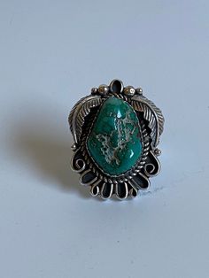 Turquoise and Sterling Silver ring signed Yellowhorse with a picto of two rearing horses. Size is 7. Ring face measures approximately 1 1/2" x 1 1/4" Signed  Yellowhorse. Please view all photos as part of this description. I am always happy to respond to questions. Silver Turquoise Ring, Sterling Silver Rings Turquoise, Turquoise Ring Silver, Silver Turquoise, Turquoise Sterling Silver, Rings Statement, Sterling Silver Ring, Turquoise Ring, Statement Rings