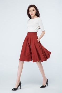 "This Skater skirt is a Red full circle skirt, the linen skirt has a high waisted. The midi skirt open by Invisible zipper on center back. A Nice 50's style skirt with side pockets, made with super linen , featuring high waist design, This red skater skirt will give you a nice looking for work or casual days DETAIL * 50% linen, 50% cotton * No lining * Seam pocket * Back zipper closure * Knee Length * Circle skirt, skater skirt * Perfect for summer, spring * Wash by hand or machine with cold wat Red Cotton Flared Skirt Bottoms, Voluminous A-line Ruffled Skirt, Red Cotton Midi Skirt, Red Gathered Skirt For Spring, Red Knee-length Pleated Skirt, Red Cotton Long Skirt, Red Flared Skirt For Spring Season, Red Flared Skirt For Spring, Fitted Red Lined Skirt