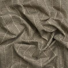 a close up view of a fabric with wavy lines on the top and bottom of it