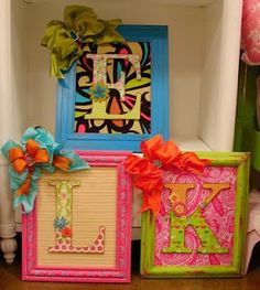 three colorful frames are stacked on top of each other in front of balloons and flowers