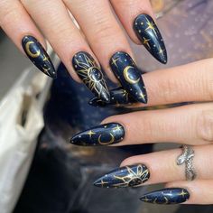 Gold Crescent Moon Nails, Fantasy Inspired Acrylic Nails, Moon Star Nails Design, Dark Blue Nails With Moon And Stars, Almond Nails Moon Design, Moon On Nails Art Designs, Astrological Nail Art, Leo Constellation Nails, Dark Whimsical Nails