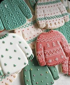 decorated cookies with sweaters and mittens on them