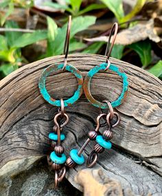 Patinated Turquoise Blue Copper Earrings with Dyed Howlite Dangles Copper Dangle Earrings With Patina, Copper Dangle Jewelry With Patina, Blue Artisan Copper Earrings, Artisan Blue Copper Earrings, Turquoise Copper Earrings, Blue Hammered Artisan Jewelry, Artisan Blue Hammered Jewelry, Artisan Rust-colored Jewelry With Patina, Turquoise Artisan Electroformed Earrings