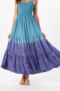 With its floor-grazing length, the Avisa Maxi Dress exudes bohemian elegance, making it perfect for everything from beach weddings to summer soirées. Whether you're dancing under the stars or strolling along the shore, this dress is sure to make you feel like a goddess. Details: 100% Rayon Hand Wash in Cold Water and Lay Flat to Dry Features: Unlined, Smocked Bodice, Self-tie spaghetti strap closure, Tassel tie detail on straps, Open back detail for an adjustable fit, Tiered Maxi Skirt. Measurem Summer Flowy Beach Cover-up Dress, Beach Maxi Dress With Flowy Skirt, Flowy Tiered Breezy Maxi Dress, Flowy Floor-length Breezy Maxi Dress, Breezy Tiered Skirt Beach Dress, Summer Tiered Flowy Dress, Bohemian Maxi Skirt For Beach Party In Spring, Bohemian Spring Maxi Skirt For Beach Party, Bohemian Maxi Skirt For Spring Beach Party