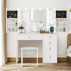 a white vanity with lights on it in a bedroom next to a bed and window