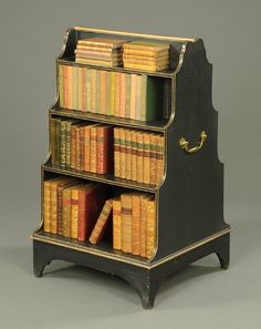 an old bookcase with many books on it