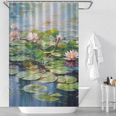 a shower curtain with water lilies on it