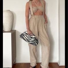 Perfect For Vacation And Hotter Weather! Chic Overall Bottoms For Vacation, Chic Vacation Overalls, Summer High-waisted Jumpsuits And Rompers For Day Out, High-waisted Summer Jumpsuits And Rompers For Day Out, High-waisted Jumpsuits And Rompers For Summer Day Out, Casual High-waisted Jumpsuits And Rompers For Day Out, Casual High-waisted Jumpsuits For Day Out, Casual Beige High Waist Jumpsuit, Hot Weather