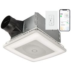 a ceiling mounted exhaust fan with remote control and an appliance next to it