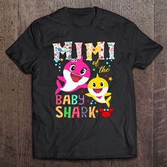 Mimi Of The Baby Shark Birthday Mimi Shark Mother’s Day T-Shirt, Mother’s Day Shirts, Mother’s Shirts The T-Shirt, a timeless wardrobe staple, combines comfort with effortless style. Crafted from soft, breathable fabrics, it ensures a cozy fit for everyday wear. Its versatility makes it a go-to choice for various occasions, from casual outings to laid-back... Mommy Shark, Baby Shark Birthday, Shark Gifts, Mother Shirts, Shark Shirt, Shark T Shirt, Shark Birthday, Timeless Wardrobe, Mothers Day T Shirts