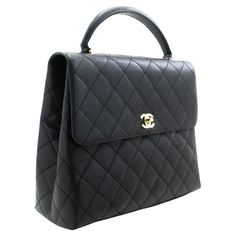 An authentic CHANEL Caviar Handbag Top Handle Bag Kelly Black Flap Leather Gold. The color is Black. The outside material is Leather. The pattern is Solid. This item is Vintage / Classic. The year of manufacture would be 2 0 0 2 . Conditions & Ratings Outside material: Grained Calfskin (Caviar Leather) Color: Black Closure: Turn Lock Hardware: Gold-Tone Made in France Serial sticker: Attached Comes with: Authenticity card, Dust bag Overall: 8 of 10 - The outside is in excellent condition with minimal signs of use only. The inside is also excellent and very clean with very slight scratches. No stickiness or peeling. All the hardware is shiny and excellent. The dust bag is also great. Highly recommended! Approx. size: H10" x W11.6" x D4.2" (H25.5 x W29.5 x D10.8 cm) Approx. handle drop: 2.6" Structured Shoulder, Dream Closets, Chanel Caviar, Black Caviar, Hardware Gold, Chanel Black, Gold Leather, Handle Bag, Fashion Handbags