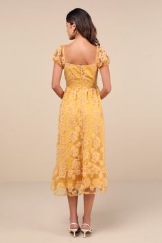 No matter the occasion, everyone will be curious about the identity of the beauty in the Lulus Notable Elegance Yellow Mesh Floral Applique Bustier Midi Dress! Lightweight mesh features a stunning pattern of 3D floral appliques as it shapes sheer puff sleeves with elastic at the cuffs and shoulders. Bodice has a sweetheart neckline with seamed cups and a high, fitted waist. A-line skirt falls to a tiered midi hem to complete the look. Hidden zipper/clasp at back. Fit: This garment fits true to s Gold Summer Dress With Sweetheart Neckline, Elegant Yellow Midi Dress With Square Neck, Elegant Yellow Square Neck Midi Dress, Yellow Square Neck Midi Dress For Party, Yellow Fitted Lace Midi Dress, Elegant Yellow Lace Midi Dress, Bustier Midi Dress, Be Curious, Adhesive Bra