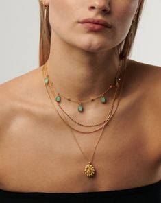 Lena Charm Choker | 18ct Gold Plated Vermeil/Amazonite. Our Best Selling Lena Charm Choker Necklace Features Evenly Spaced Amazonite Gemstones – Known for Healing – Sitting on a Delicate 18Ct Gold Vermeil Bobble Chain. Layer with Chain Necklaces or Pair with the Lena Charm Necklace. Metal: 18Ct Gold Plated Vermeil on Sterling Silver Gemstone: Amazonite Gemstones Dimensions: 9 X 6. 5 mm Chain: Total Length 380 mm with Continuous Extension from 310 mm to 380 mm Weight: 5 g Product Code: Zu-G-Nc7-A Double Chain Bracelet, Fan Necklace, Charm Choker Necklace, Double Chain Necklace, Malachite Necklace, Amazonite Necklace, Leaf Bracelet, Silver Choker, Pearl Pendant Necklace