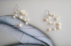 About the design:Selection of natural pearls to ensure quality, pure handmade, handmade meticulous improve the design texture.About the metal:Strengthened fishing line bead bonding process.100%Satisfaction guaranteed customer service.Thanks. Handmade Pearl White Pearl Earrings, Handmade Delicate Pearl Earrings, Handmade Baroque Pearl White Earrings, Handmade Baroque Pearl Earrings In Pearl White, Handmade Baroque Pearl Earrings For Party, Minimalist White Akoya Pearl Earrings, Handmade White Minimalist Pearl Earrings, Handmade Minimalist White Pearl Earrings, Minimalist Handmade White Pearl Earrings