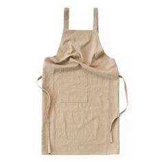 the apron is made out of linen and has a pocket for pockets to hold items