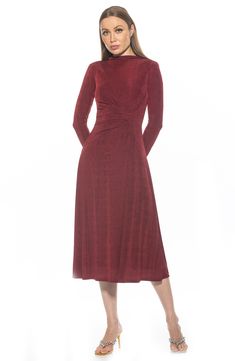 An elegantly draped funnel neck and gathered waist highlight a charming fit-and-flare dress constructed with comfortable stretch. 51 1/2" length Hidden back-zip closure Funnel neck Long sleeves Partially lined 97% polyester, 3% spandex Machine wash, line dry Imported Ruched A-line Midi Dress For Cocktail, Elegant Fitted Midi Dress With Cowl Neck, Fall A-line Midi Dress With Fitted Waist, Pre-draped A-line Ruched Dress, Cocktail Dresses With Gathered Waist And Fitted Style, Fitted Cocktail Dress With Gathered Waist, Evening Dress With Ruched Fitted Waist, Fitted Dresses With Gathered Waist For Cocktail, Fitted Midi Dress With Ruched Bodice For Fall