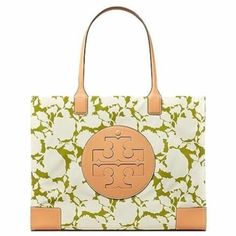 Tory Burch Ella Tote Large Handbag Bag New Brand New With Tag, In Original Package! Color: Green Bold Flower Lightweight Tote With A Logo Patch. The Ella Is Made Of Durable Recycled Polyester With A New Interior Laptop Pocket. Ideal For Every Day And Getaways, It Has Room For All Your Essentials. Height: 13.2" X Length: 17.3" X Depth: 5.2" Fits A Laptop Up To 13" Outer Shell: 100% Recycled Polyester; Faux Leather Trim Lining: 100% Recycled Polyester Magnetic Bridge And Gusset Snap Closure Top Ha Tan Coated Canvas Shoulder Bag, Designer Tan Bags For On-the-go, Designer Green Coated Canvas Shoulder Bag, Green Coated Canvas Tote Bag, Tan Shoulder Bag With Removable Pouch, Tan Coated Canvas Bag With Top Carry Handle, Green Coated Canvas Tote Shoulder Bag, Green Coated Canvas Bag With Top Carry Handle, Tan Coated Canvas Bags For On-the-go