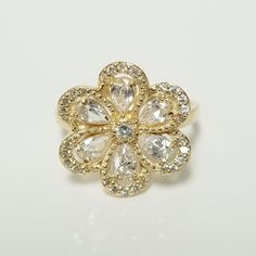 "Thanks for shopping our vintage estate store. We tend to sell well below wholesale and truly hope you enjoy all of our items. Many of the items are one of a kind, so please enjoy scrolling through the pictures and hopefully something will catch your eye. Black spots are from reflections. Estate 14k yellow gold cz 1ct diamond filigree princess ring. I just love this style. Ring size: 8 Setting: 3/4\"  Band width: 2mm Weight: 3.87 grams Marked 14k. Sweet ring. Pear and round cz diamonds in the setting. As with most estate items, there may be some wear on item. We do not sell new items, nor do we charge new retail prices." Cubic Zirconia Flower-shaped Diamond Ring For Anniversary, Flower Shaped Cubic Zirconia Diamond Ring For Anniversary, Cubic Zirconia Diamond Ring In Flower Shape For Anniversary, Classic Flower Ring In Diamond White Cubic Zirconia, Classic Diamond White Cubic Zirconia Flower Ring, Classic Diamond Ring With Flower Shape, Classic Wedding Rings With Flower Shape, Classic Flower Ring With Diamond Accents In Cubic Zirconia, Classic Flower Ring With Diamond Accents