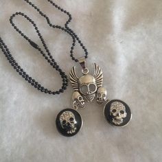 "3 skull necklace with dangling black rhinestone bling buttons 20\" chain ... Never been worn Free gift box NO Returns This necklace was a part of the inventory from my old antique shop.   Most of the jewelry was made over 10 years ago from bits and pieces found in other antique stores and estates sales. All jewelry sold \"as is\".  no returns on jewelry Check out my other Etsy Shops: https://www.etsy.com/shop/oldporchsigns https://www.etsy.com/shop/oldvintageporch Most of my signs, crafts and h Nickel Free Black Skull Necklace, Black Nickel Free Skull Necklace, Vintage Black Skull Jewelry, Black Nickel-free Skull Necklace, Halloween Necklace, Button Necklace, Bling Necklace, Antique Shop, Bits And Pieces