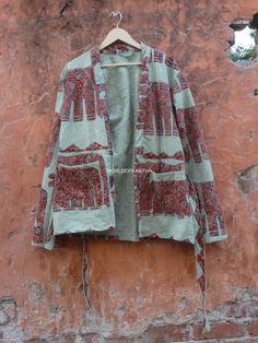 Please MESSAGE US for Wholesale Custom Order Product: 1 PC Printed Cotton kantha Quilted Jacket with belt Cotton Jacket made From Hand block Printed Kantha Quilt.It is hand Stitched fabric using natural dyes Measurements or Sizes: Length- 31 Inches, Bust-46 inches , Sleeve-28 inches Size: Free Size Jacket Color: Multi-color as Shown in Image. (refer to photos for all view angle) Note: Photos are taken in Natural Background. No editing is done uploading Photos. If you have any inquiry feel free t Green Long Sleeve Nehru Jacket For Fall, Cotton Nehru Jacket With Pockets, Cotton Nehru Jacket With Long Sleeves And Pockets, Cotton Nehru Jacket With Pockets And Long Sleeves, Green Long Sleeve Outerwear For Festivals, Traditional Green Cotton Outerwear, Traditional Multicolor Outerwear With Pockets, Bohemian Long Sleeve Nehru Jacket For Fall, Green Bohemian Outerwear With Pockets