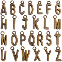 an assortment of metal letters and numbers are shown in this image, including the letter's lowercases