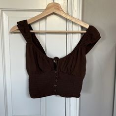 Super Cute Brown Top From Pacsun! Never Worn Size Xs Brown Sleeveless Crop Top For Vacation, Brown Spring Beach Crop Top, Sleeveless Brown Crop Top For Vacation, Brown Summer Crop Top For Vacation, Brown Fitted Crop Top For Vacation, Summer Brown Crop Top For Vacation, Chic Brown Crop Top For Vacation, Brown Summer Beach Crop Top, Brown Sleeveless Summer Crop Top