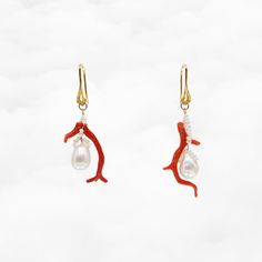 The Red Coral and Pearl Branch Earrings are inspired by the mystery and wonder of the dragon palace. Featuring a red coral branch and seed pearls, paired with gold-plated auspicious cloud ear wires, these earrings embody the elegance and vitality of the ocean’s treasures with a celestial touch.   ❀ Natural Red Coral Branch; Wire Wrapped Teardrop Pearl   ❀ Gold Plated Sterling Silver Auspicious Cloud Ear Wire   ❀ Length  2.25 in.  (55mm) Dragon Palace, Branch Earrings, Seed Pearl, Red Coral, Natural Red, The Dragon, Ear Wire, Gold Plated Sterling Silver, Ear Wires